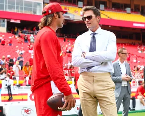 The seven-time Super Bowl champion sparks online backlash after being spotted in Raiders coaching booth